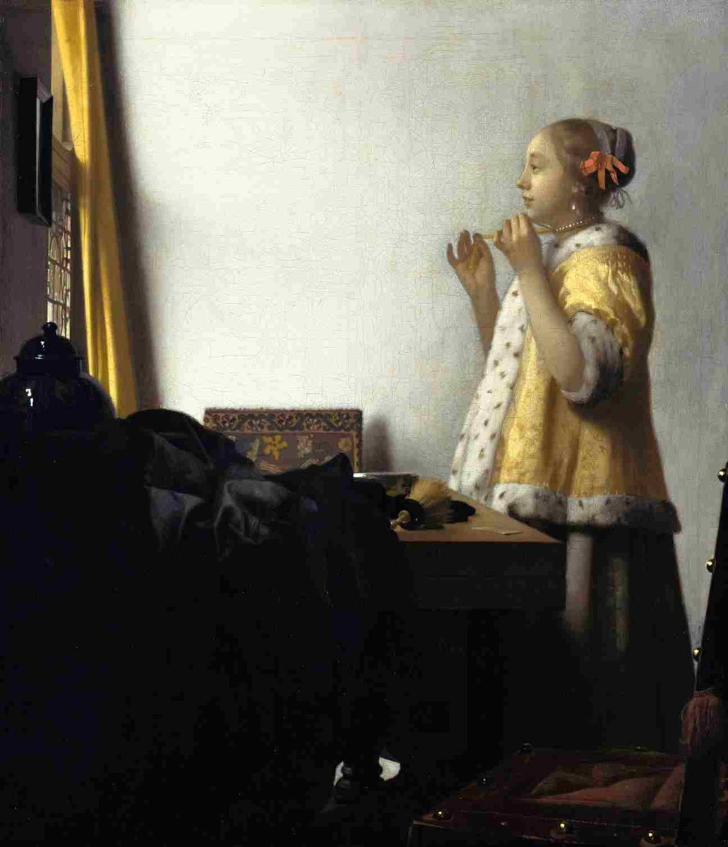 Johannes Vermeer Young Woman with a Pearl Necklace (from 1663 until 1665)
